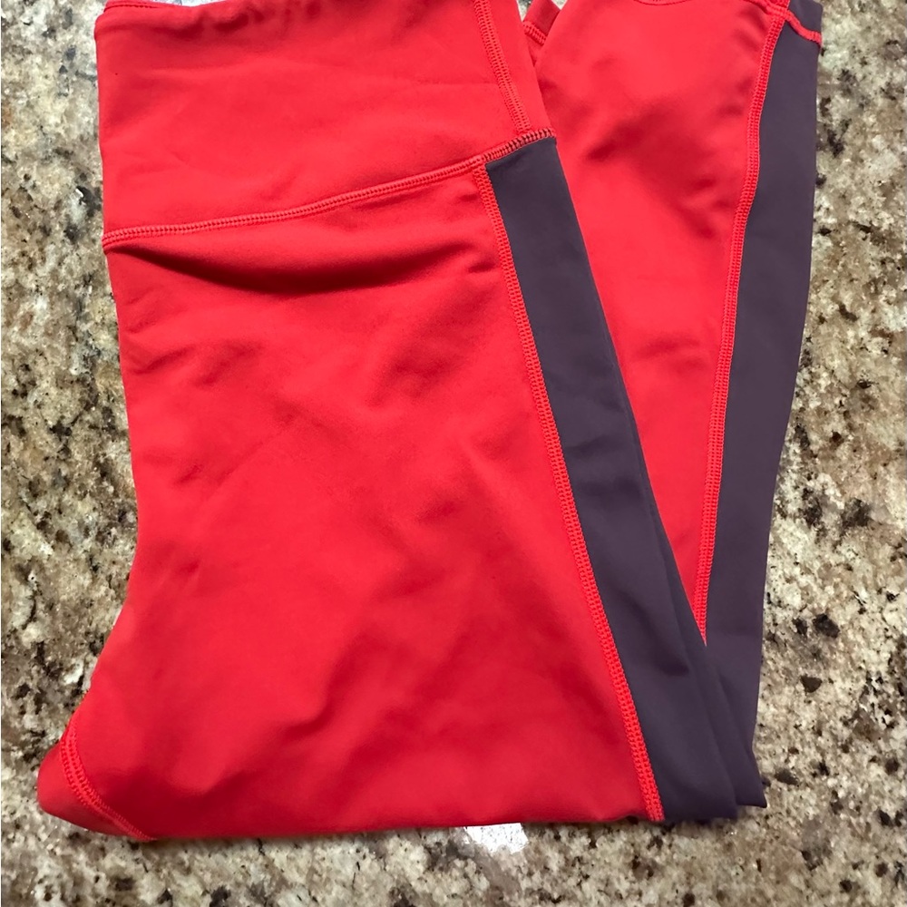 Zyia red and black capri leggings.